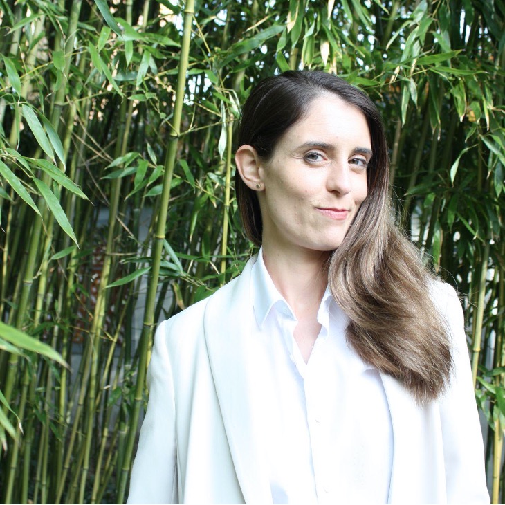 A profile of Jasmin Dall’Agnola against a backdrop of bamboo