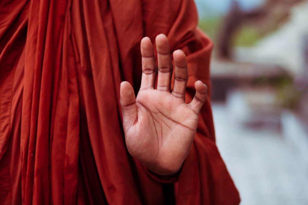 Hand of budhist monk