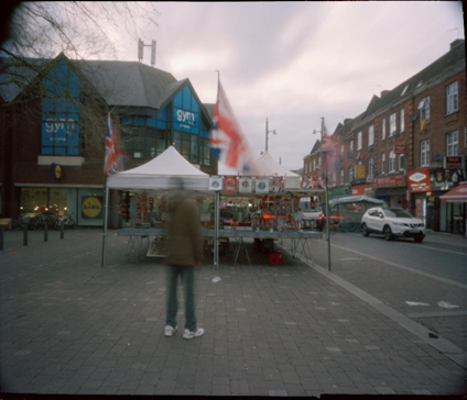 A blurry picture of someone on the street