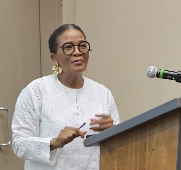 A woman at a a podium