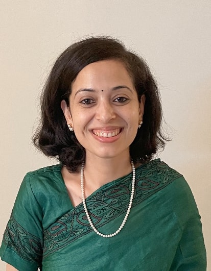 Picture of a South Asian woman in green sari
